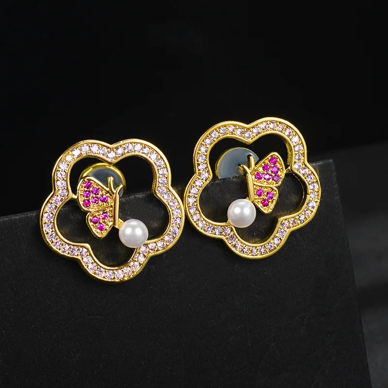 

Korean version of the new inlaid zircon butterfly flower earrings fashion personality wave circle woman earrings