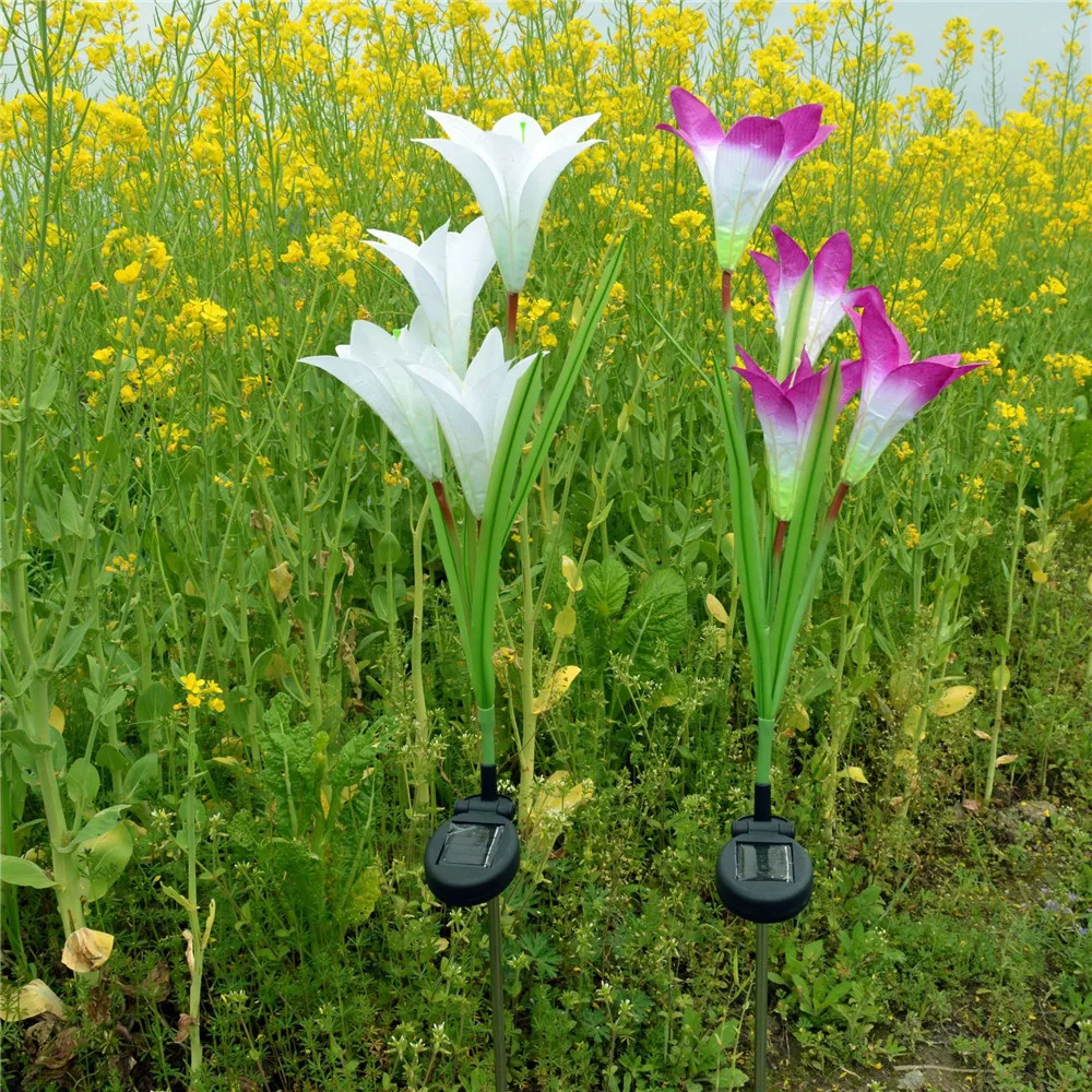 

2 Pcs Lily Flower Solar Powered Garden Stake Lights Artificial Flowers LED Lights Powered Stake Decoration Lily Butterfly Garden
