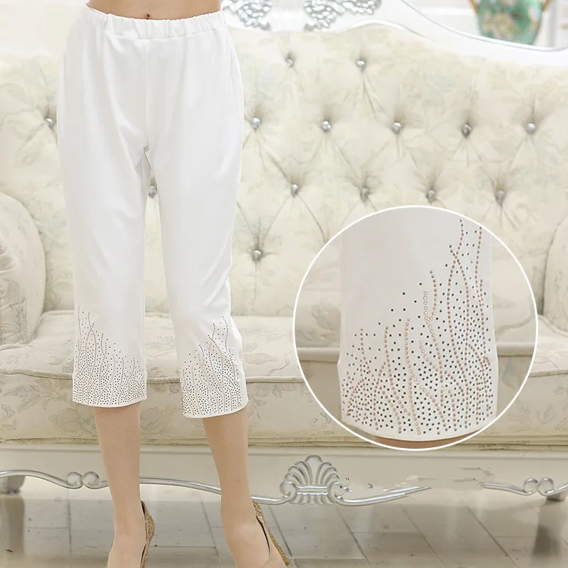 Spring Women Summer 2019 New Flowers Stretch Leggings Cropped Trousers Plus Size Middle Age Mother Fashion Casual Pants Spring Women Summer 2019 New Flowers Stretch Leggings Cropped Trousers Plus Size Middle Age Mother Fashion Casual Pants