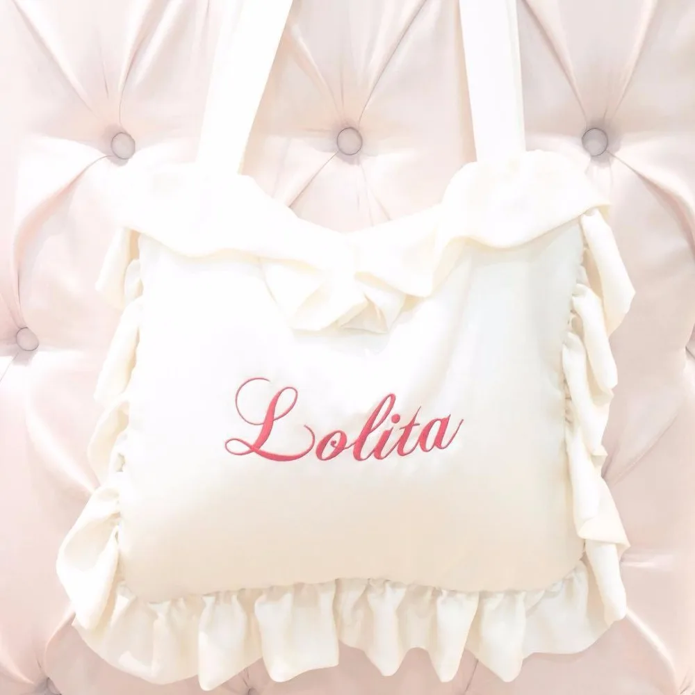 

Princess sweet lolita bag Japanese soft sister single shoulder bag lotus leaf English letter embroidered schoolbag CPQ012