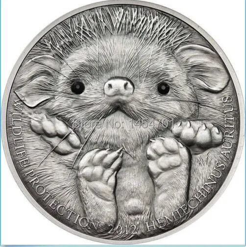 Монеты с ежами. Монета ежик в тумане. Сувенирная монета ушастый ёж 500 тугриков монголия 2012 год. Монета с ежом. Монета с ежом.