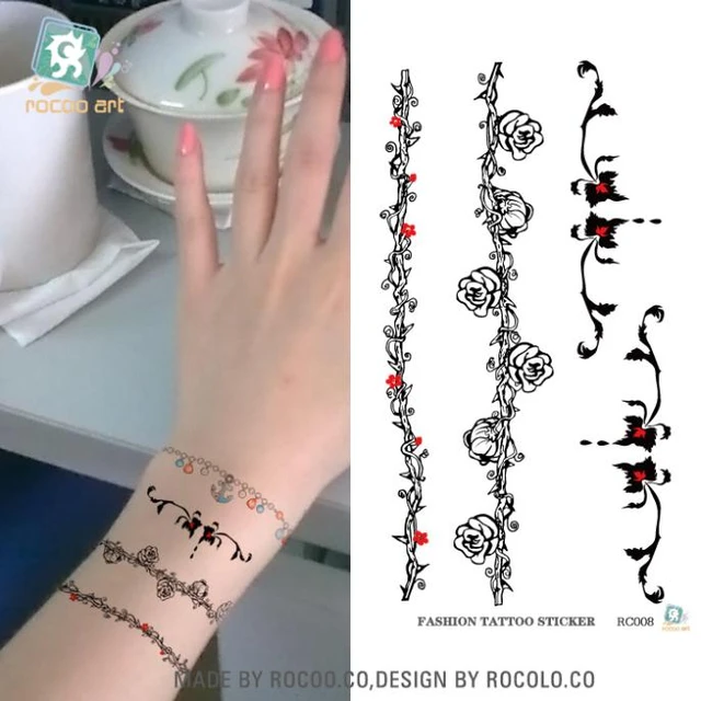 Little Tattoos — Flower bracelet tattoo. Tattoo artist: Sol Tattoo