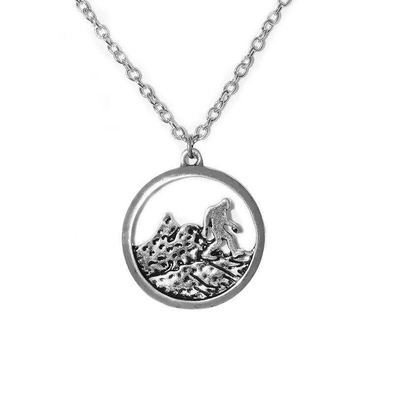 

Dropship New Fashion antique silver Minimalist Mountain Pendant necklace Bigfoot running in the mountain Necklace For Wholesale