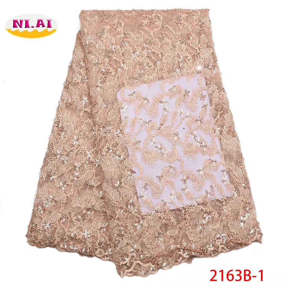 

Latest African Laces Fabrics 2018 High Quality Tulle Nigerian Lace Fabrics Wedding Stones French Tulle Lace Material XY2163B-1