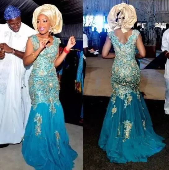 

2019 African Traditional Mother of the Bride Dresses V-neck Gold Appliques Mermaid Nigeria Formal Evening Dresses Sweep Train