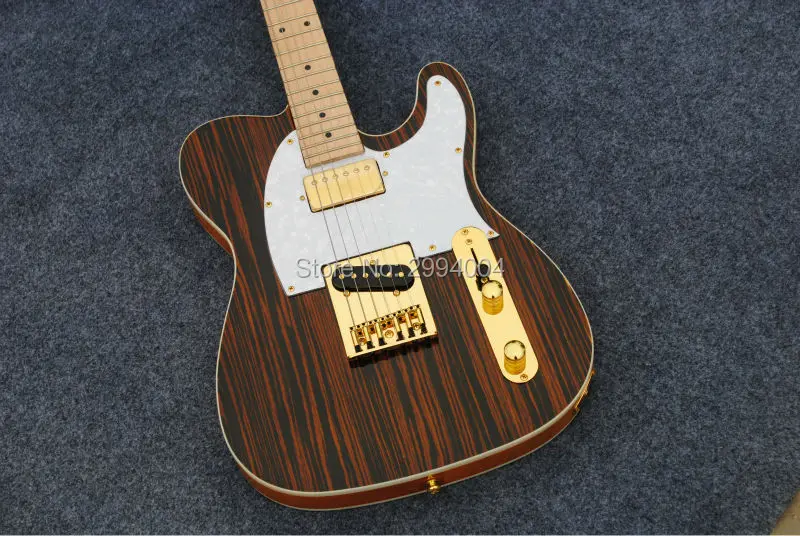 

High quality, TL electric guitar. Golden accessories. , the real photos. Factory wholesale, the wood and leather,The zebra wood