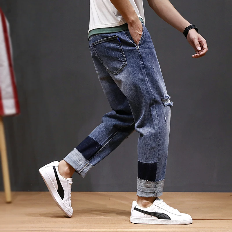 Fashion Streetwear Men Jeans Blue Color Destroyed Ripped Jeans Loose Fit Harem Pants Black Patchwork Designer Hip Hop Jeans Men