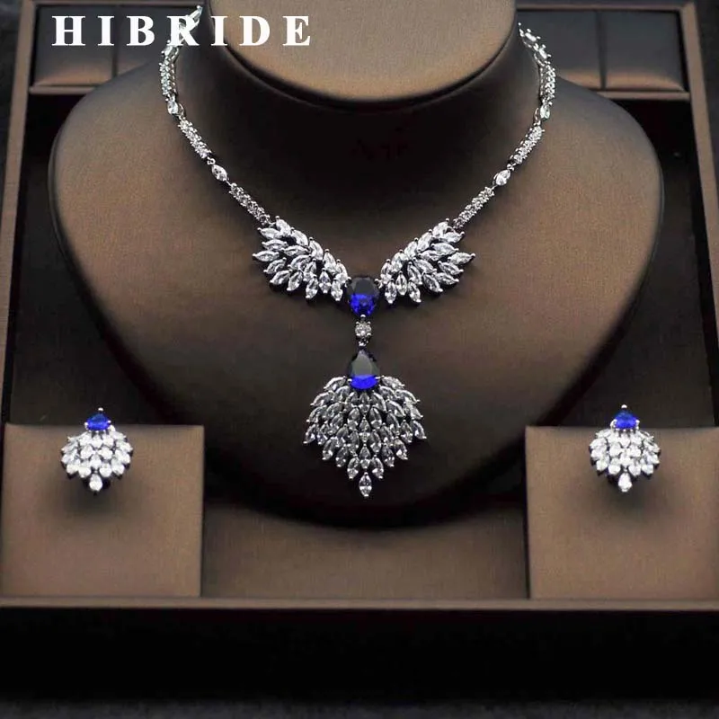 

Набор свадебных ювелирных изделий hibrid Top, с кристаллами и фианитами, элегантная форма в виде цветка, белый золотой цвет, ожерелье, серьги, наб...
