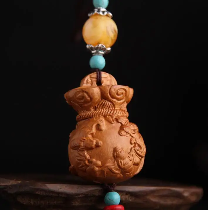 

Chinese Peach Wood Carving Animal Bat Five Blessing Money Bag Safe And Good Luck Exquisite Car Key Pendant Bag Pendant