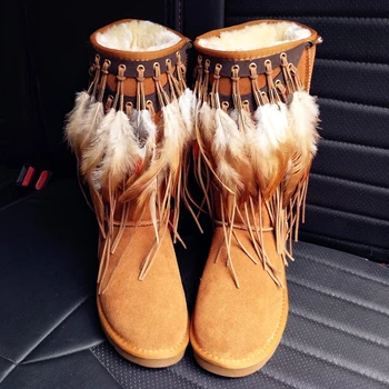 

2018 winter new real cowhide custom thick warm women's boots retro national wind feather tassel long tube snow boots.