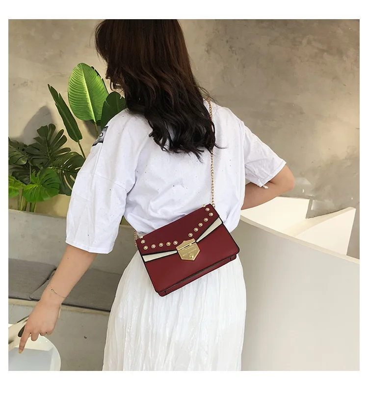 Retro rivet bag design sense lady bag clamshell PU leather lady crossbody bag chain bag new bag