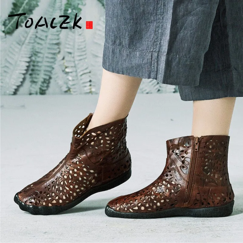

Retro embossed ethical style genuine cowhide cool boots female laser carving hollow sandals flat heel sole single boot