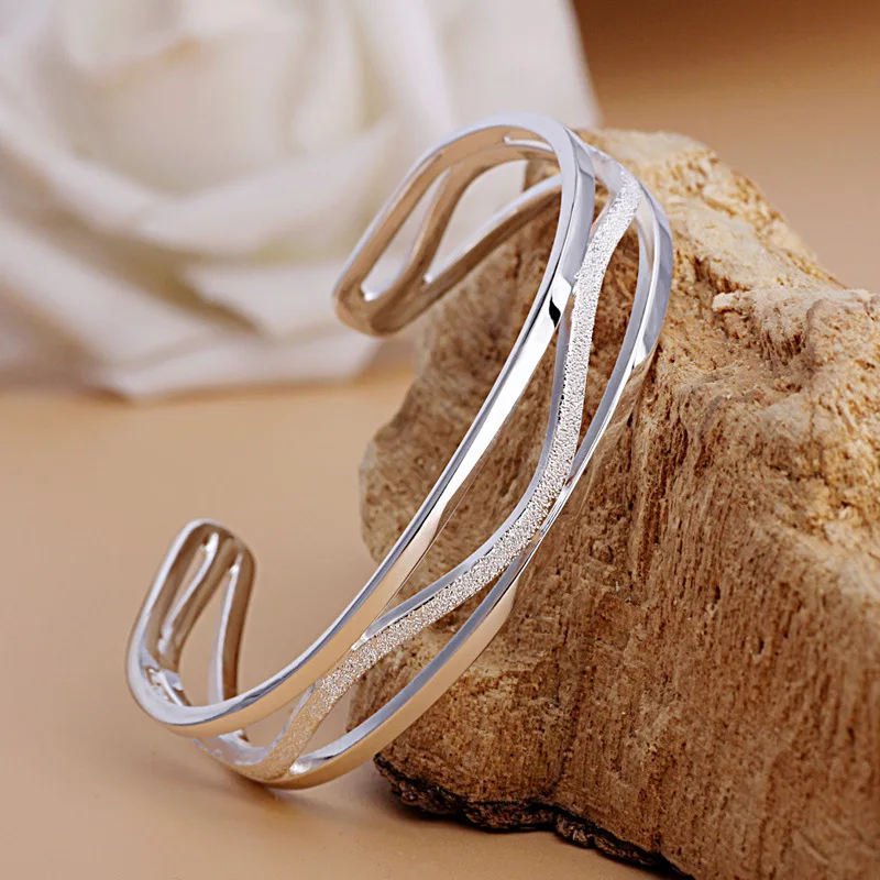

Fashion Hollow Waves 990 Silver Open Bangle
