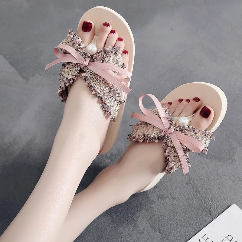 

Summer wild bow flip flops female summer Korean version of the fashion wear thick platform with the beach sandals and slippers