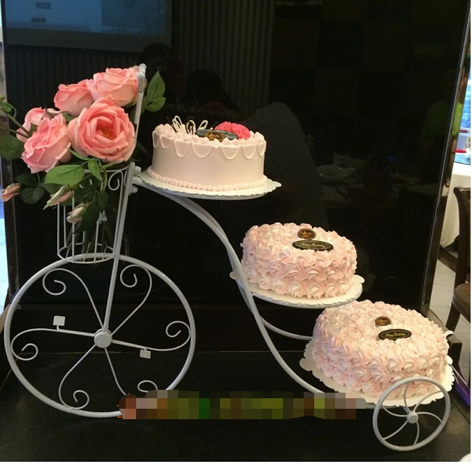Creativo europeo marco, torta hierro. boda de la bicicleta pastel de