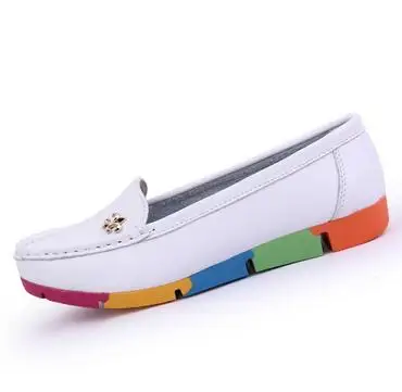 

New ballet flats, loafers and leather all slide off the ballerina's soft white and blue moccasins.
