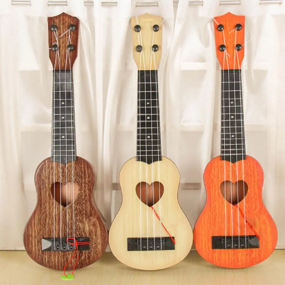 Musical Instrument Mini Ukulele Kids Guita Toys Creative School Play Game Color Randomin