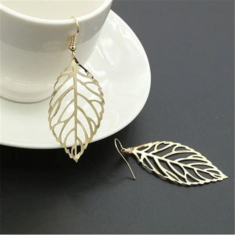 

2018 golden leaves eardrop girl female earrings popular contracted metal leaves fine jewelry accessories earrings