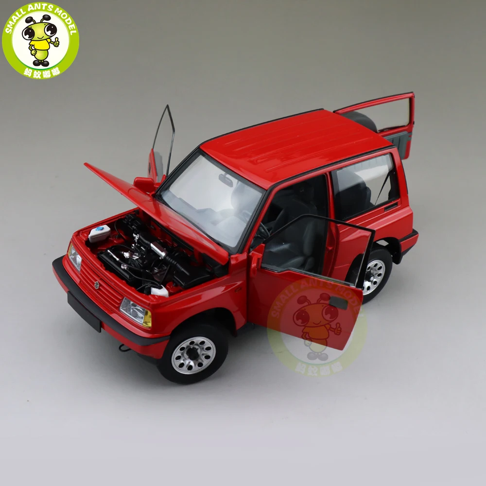 1/18 DORLOP Suzuki Vitara Escudo левосторонний диск Diecase модели автомобилей игрушки Детские подарки для мальчиков девочек красного цвета