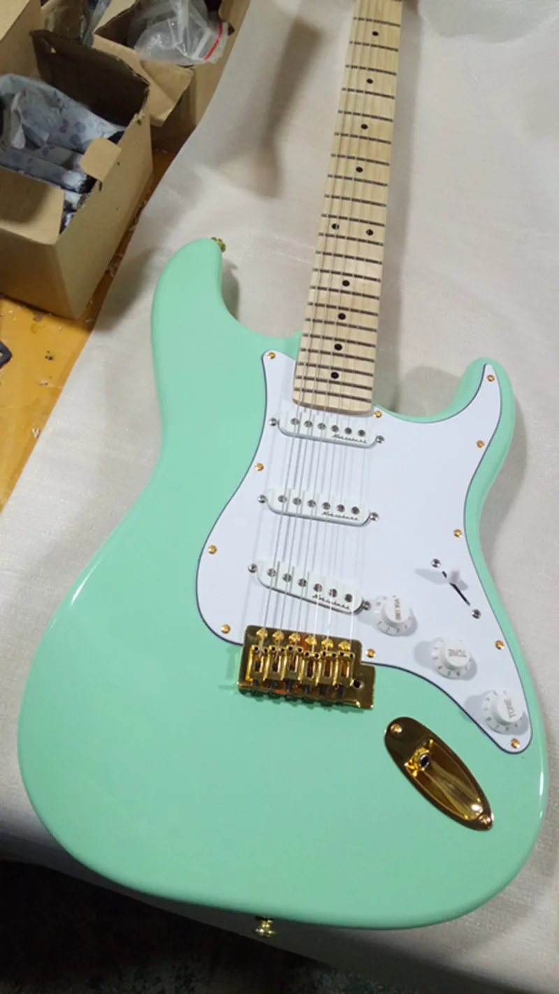 

In stock high quality ST electric guitar Gold hardware SSS pickup White pickpocket Top quality free delivery