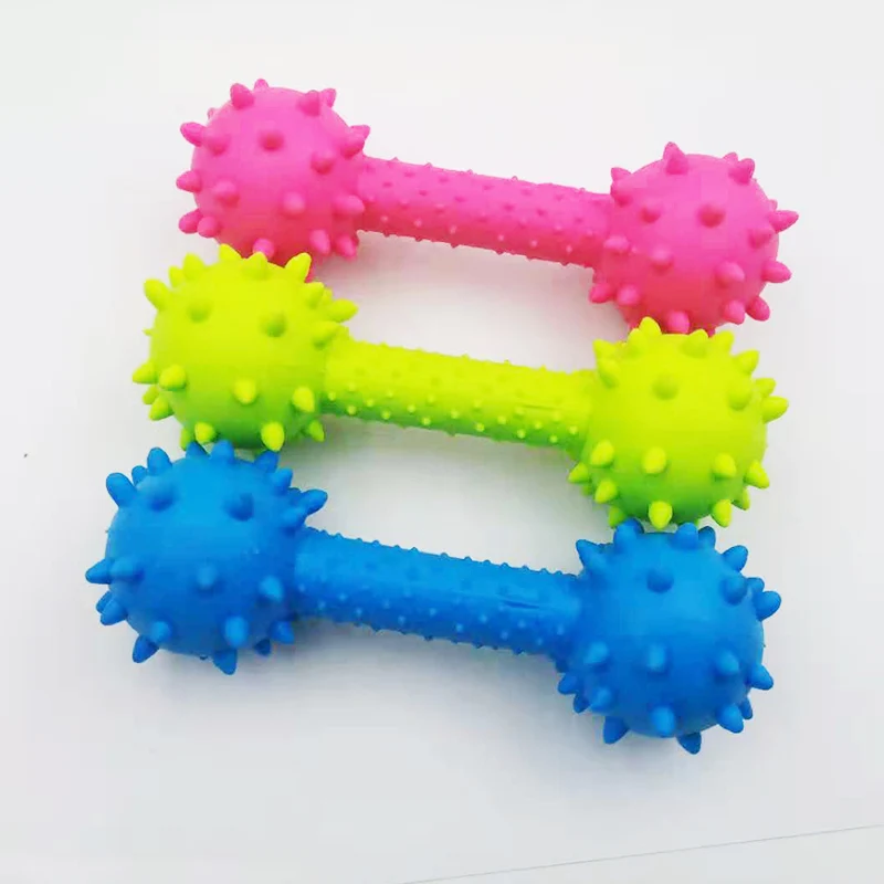 

Dog Toys Pets Puppy Dogs Chewing Toy Rubber Thorn Barbell Bone Grind the Teeth Dog Laugh Face Random Color
