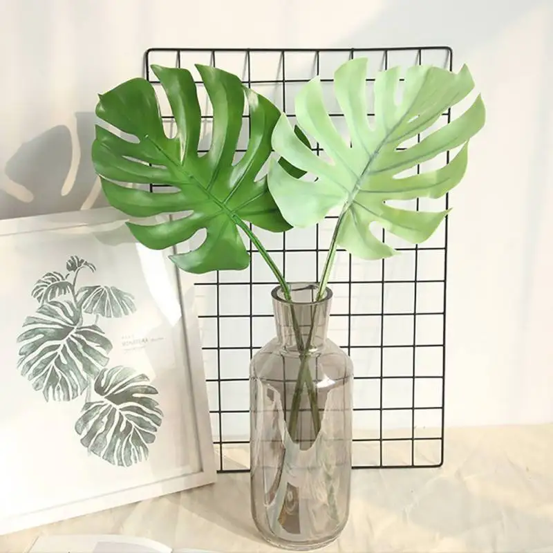 

Artificial Plants Large Artificial Fake Monstera Palm Tree Leaves Green Plastic Leaf for Wedding DIY Table Decorations