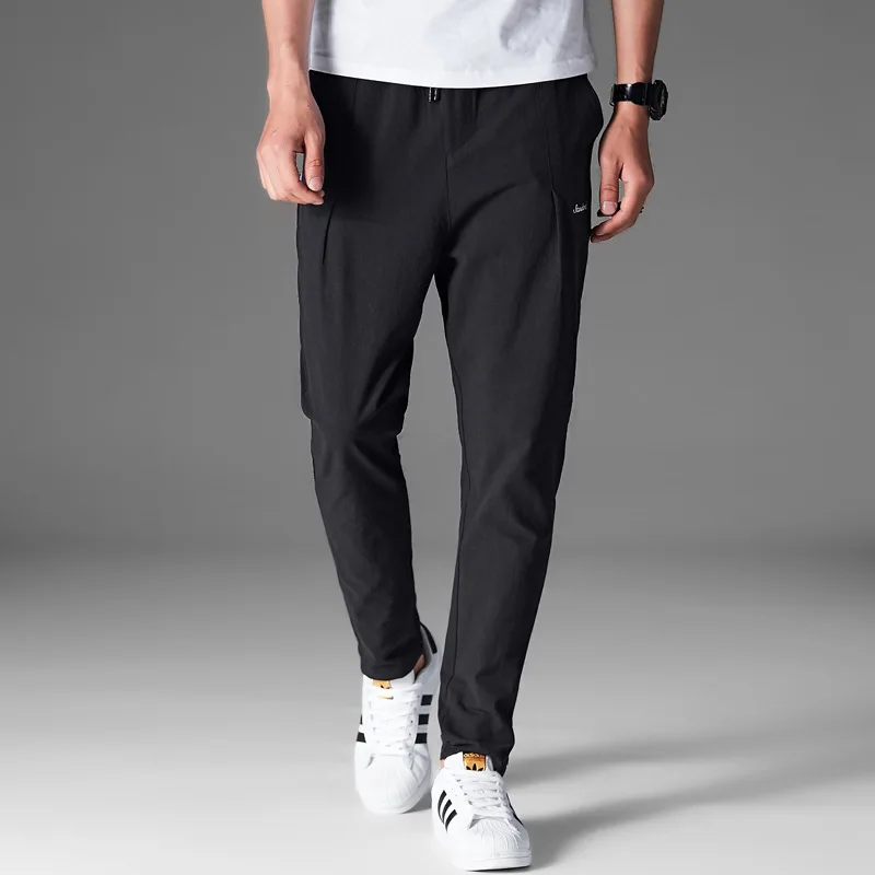 2019 new men's pants youth solid color cotton and linen casual pants male Korean version of the slim feet pants trend 5 colors