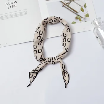 

2020 spring and autumn winter hot new print ladies fashion wild double-sided simple triangle scarf