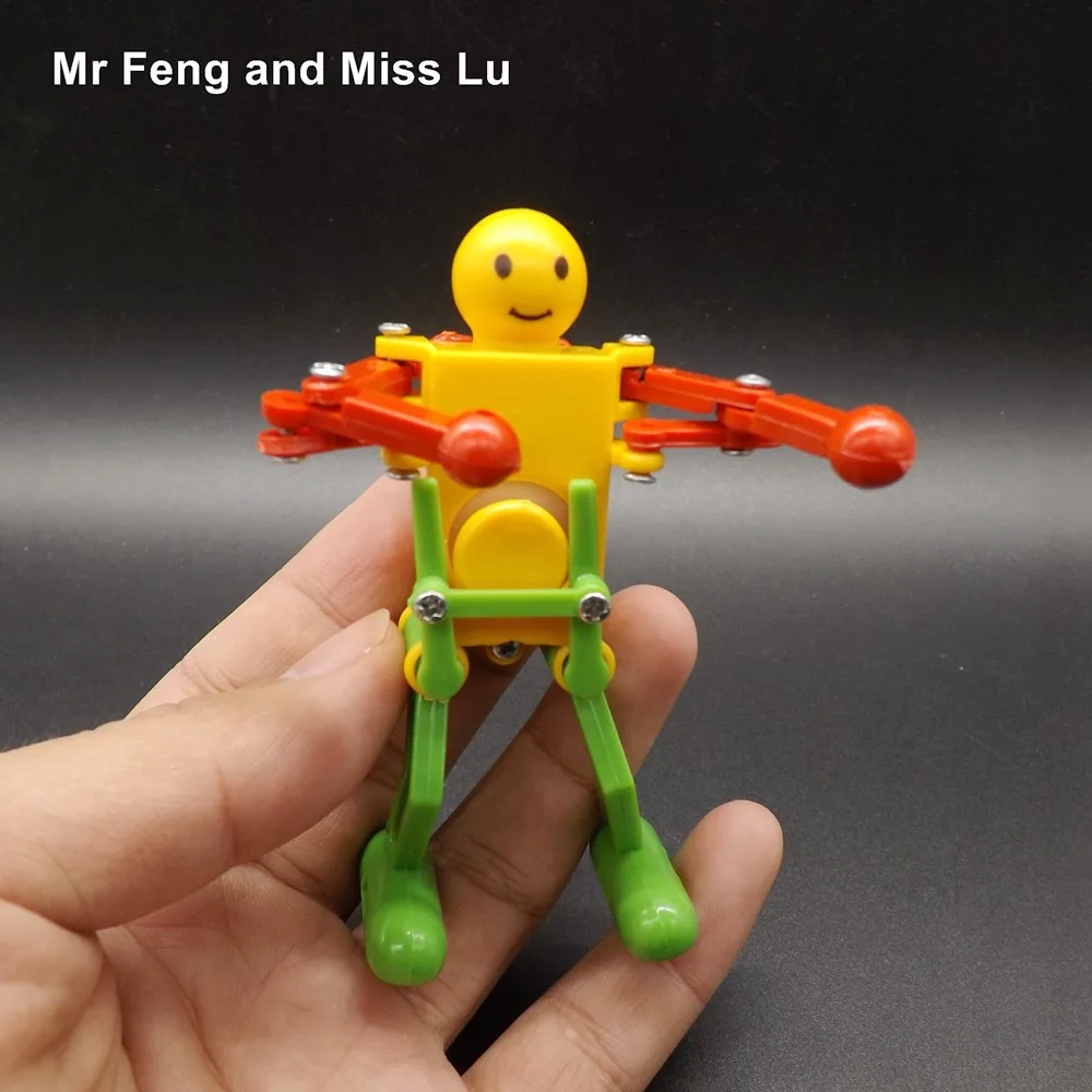 Colorful Plastic Clockwork Spring Wind Up Dancing Robot For Children Kids Toy Gift Wind Up