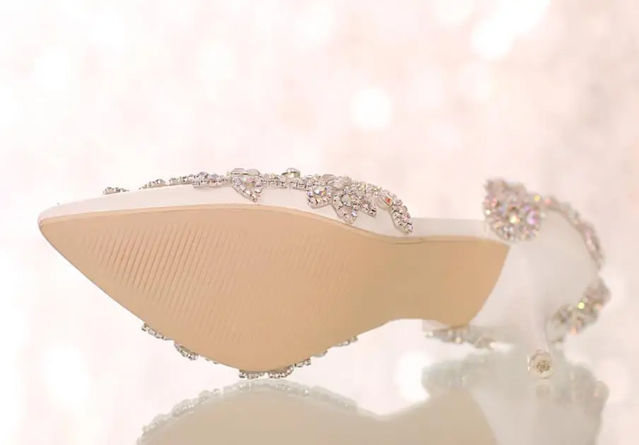 Spring and summer new fashion water drill fine heel side empty pointed high heel wedding shoes Spring and summer new fashion water drill fine heel side empty pointed high heel wedding shoes