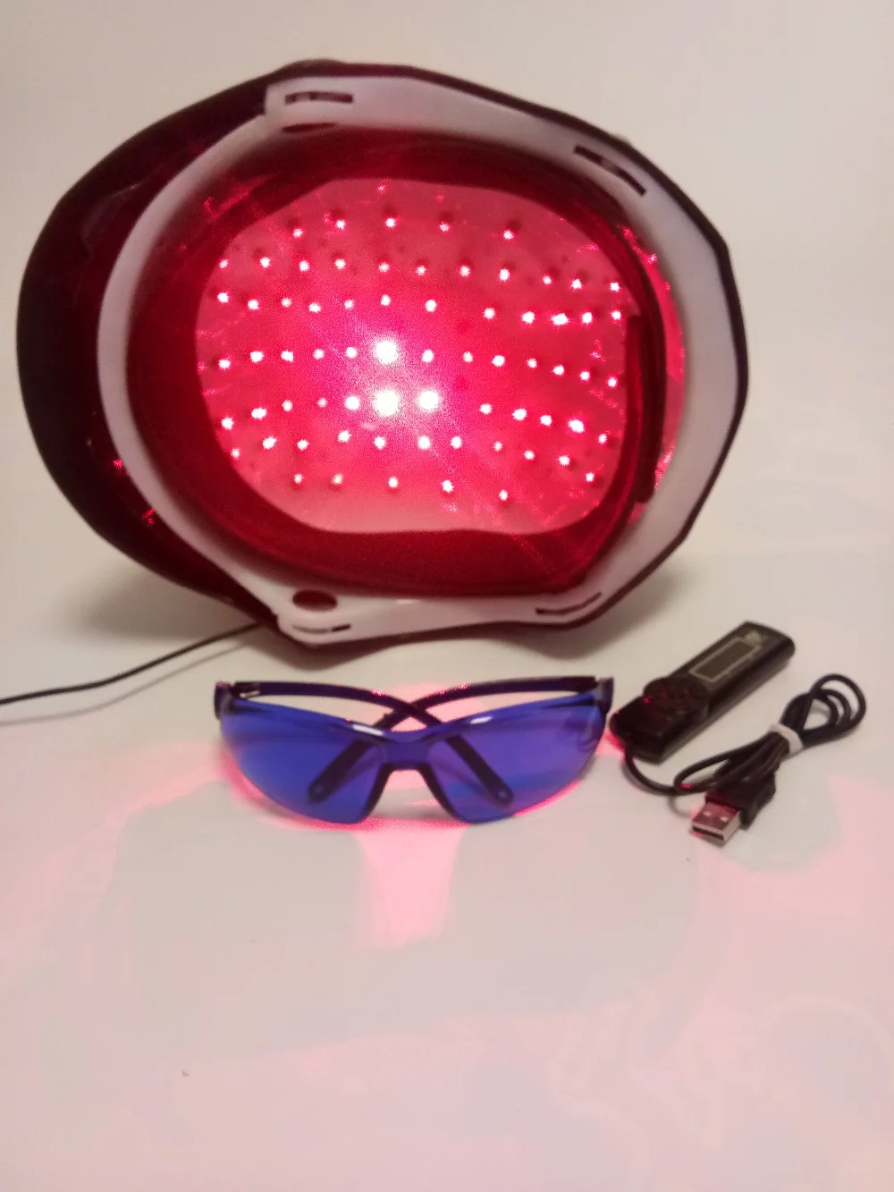 Comprar UE enchufe de EE. UU. 110 V 220 V productos para la pérdida de cabello sistema de cultivo de cabello calvidades 650nm casco de tapa láser para venta