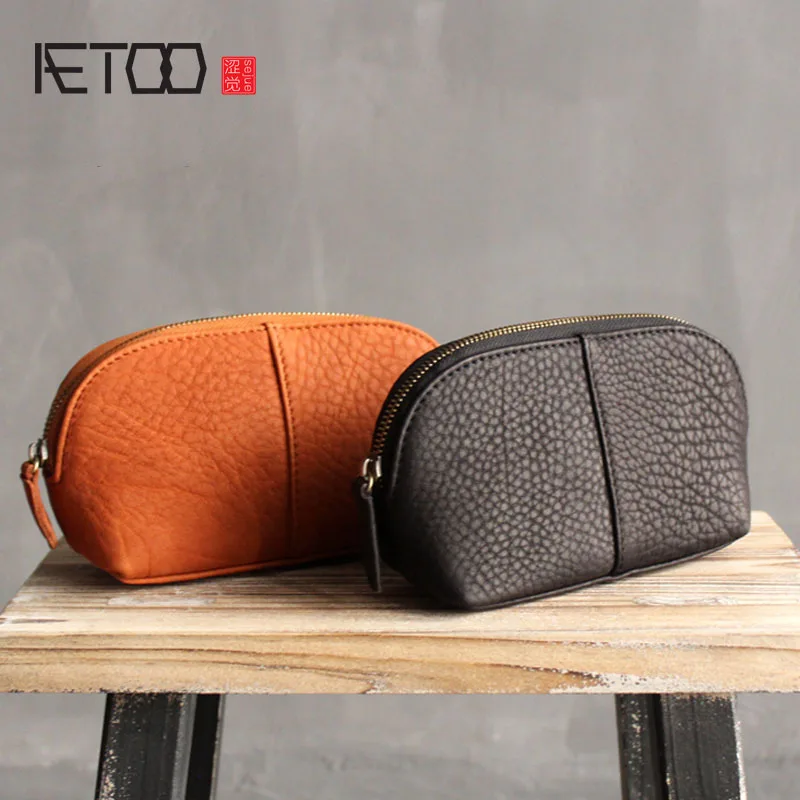 

Genuine leather handbag handbag package bag Korea portable simple leather shells large capacity mobile phone bag