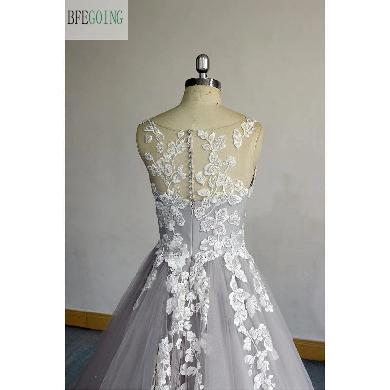 Ivory Appliques Lace Sliver Tulle Sleeveless Scoop A-line Wedding Dress Chapel Train Real/Original Photos Custom made