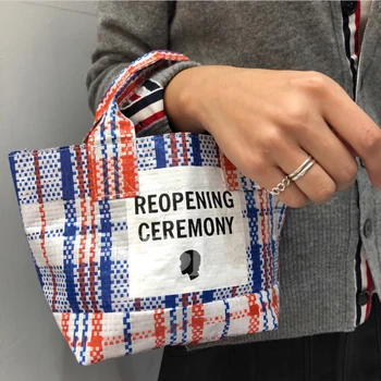 

South Korea's Dongdaemun niche designer street trend woven bag PE woven bag portable small bag