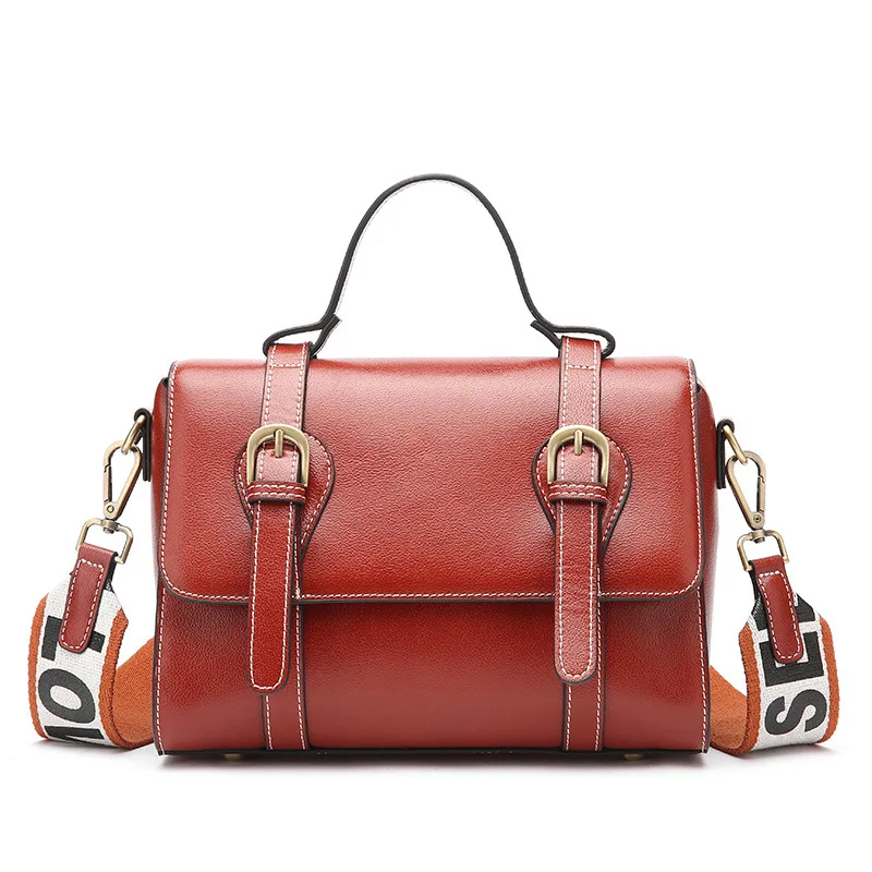 

New European and American ladies leather messenger bag Cross-section leather hand laptop shoulder slung simple handbag