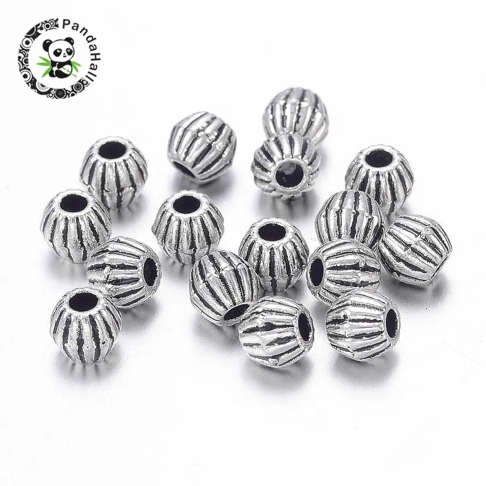 

Antique Silver Tibetan Style Bicone Beads, Lead Free & Nickel Free & Cadmium Free, Size: about 4mm long, 4.5mm wide, hole: 1mm