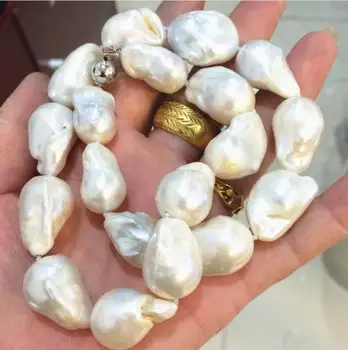 

NEW SOUTH WHITE BAROQUE PEARL NECKLACE 18"