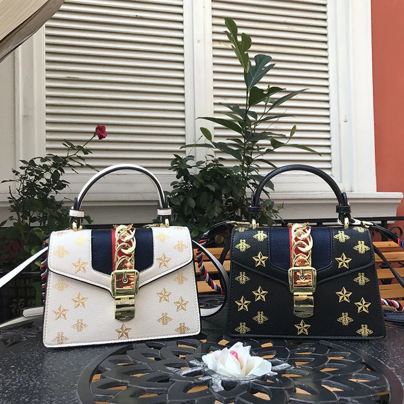 

High-quality new style European and American style PU ladies bag small square flower rivets in 2019