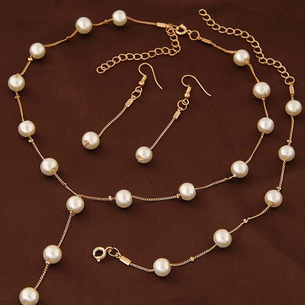 

Women Simulated Pearl Crystal Alloy Necklace Bracelet Earrings Ring Jewelry Sets