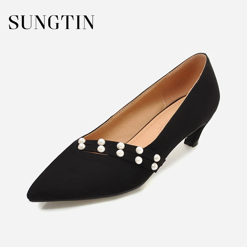 black suede pumps mid heel