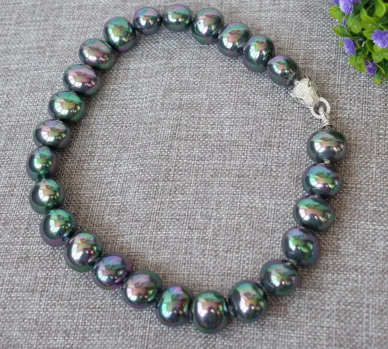 

Free Shipping >>N1504200 black sea shell pearl necklace-zircon clasp