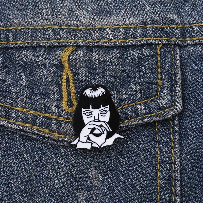 

QIHE JEWELRY GODDAMN Enamel pin Black White Lapel pins Mia Wallace Brooches for Men Women Movie Pulp Fiction Jewelry