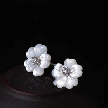 

Flower In Rain Stud Earring Women In Sterling Silver 925 &Natural Pearl Shell With A CZ Stone Handmade Original Designer Jewelry