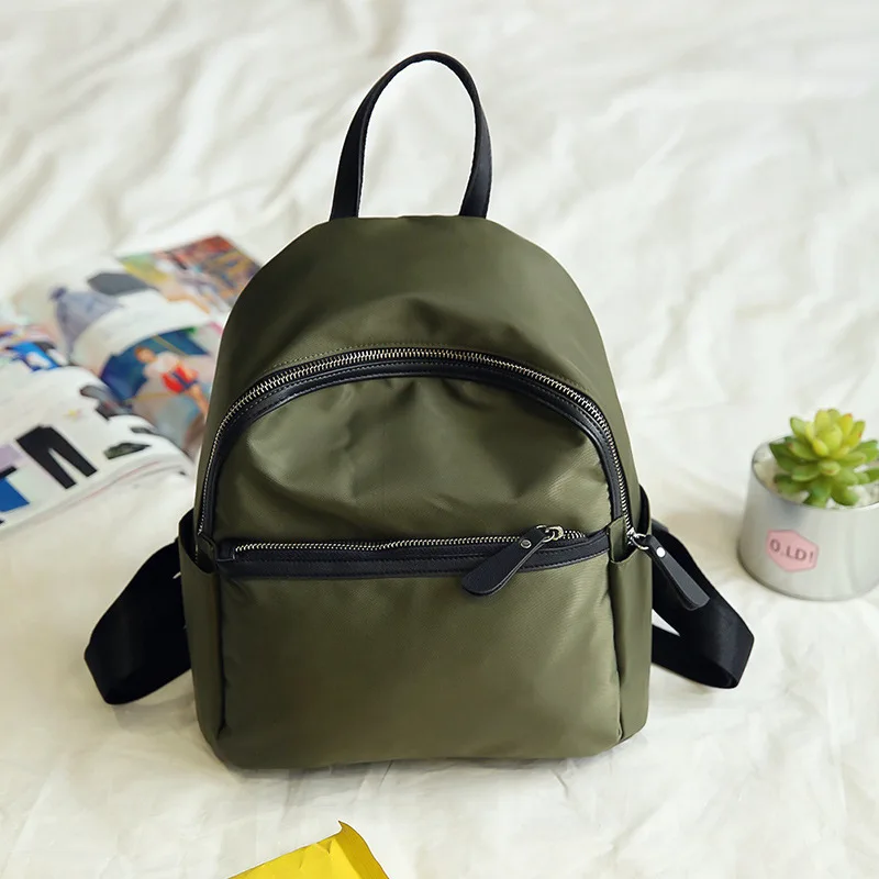 small green backpack