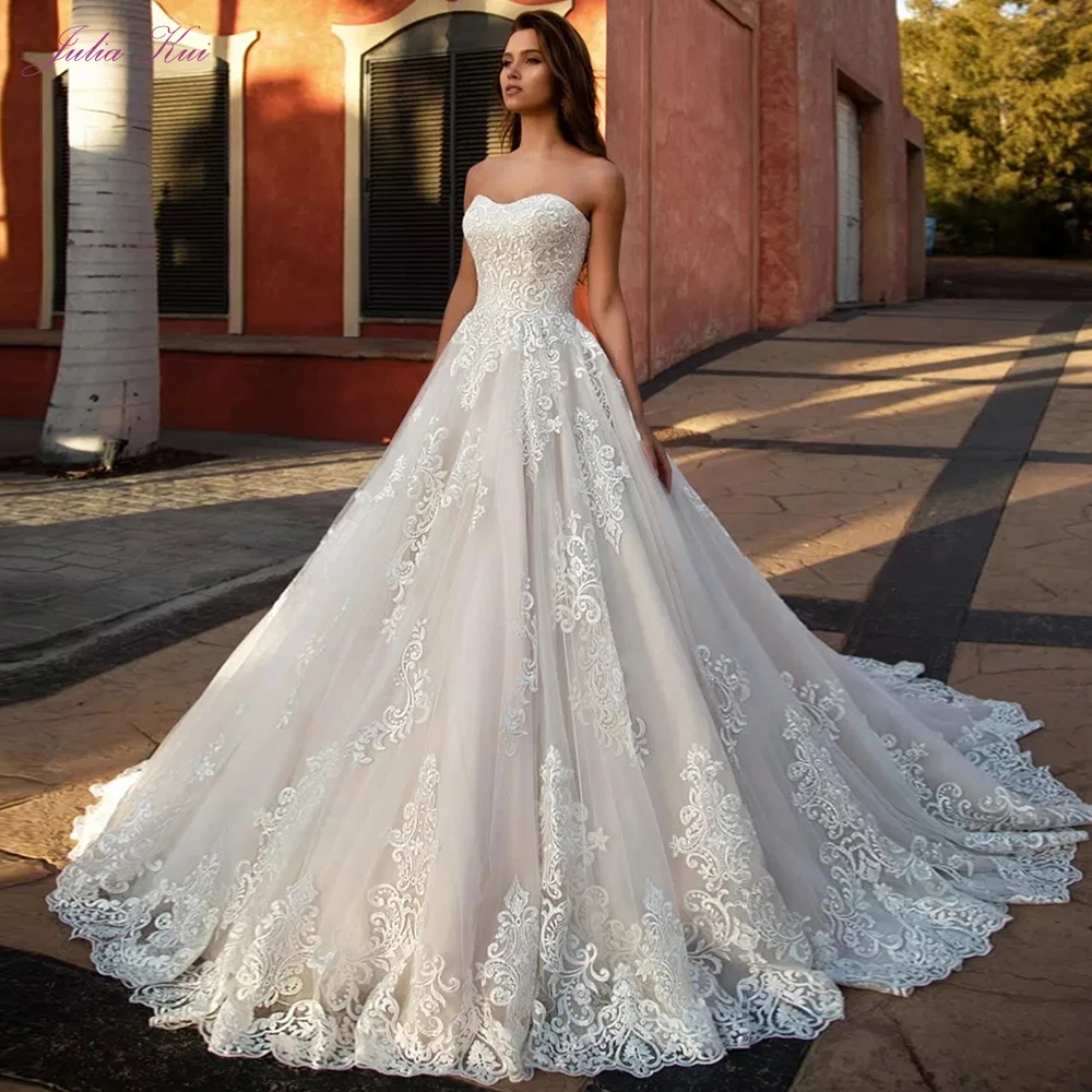 

Julia Kui Strapless A-Line Wedding Dress With Elegant Lace Of Sleeveless Symmetrical Appliques Lace Up Bride Dress