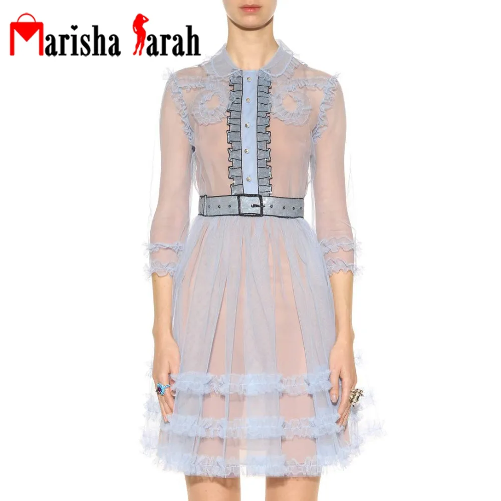 Designer black dress with sheer sleeves pants