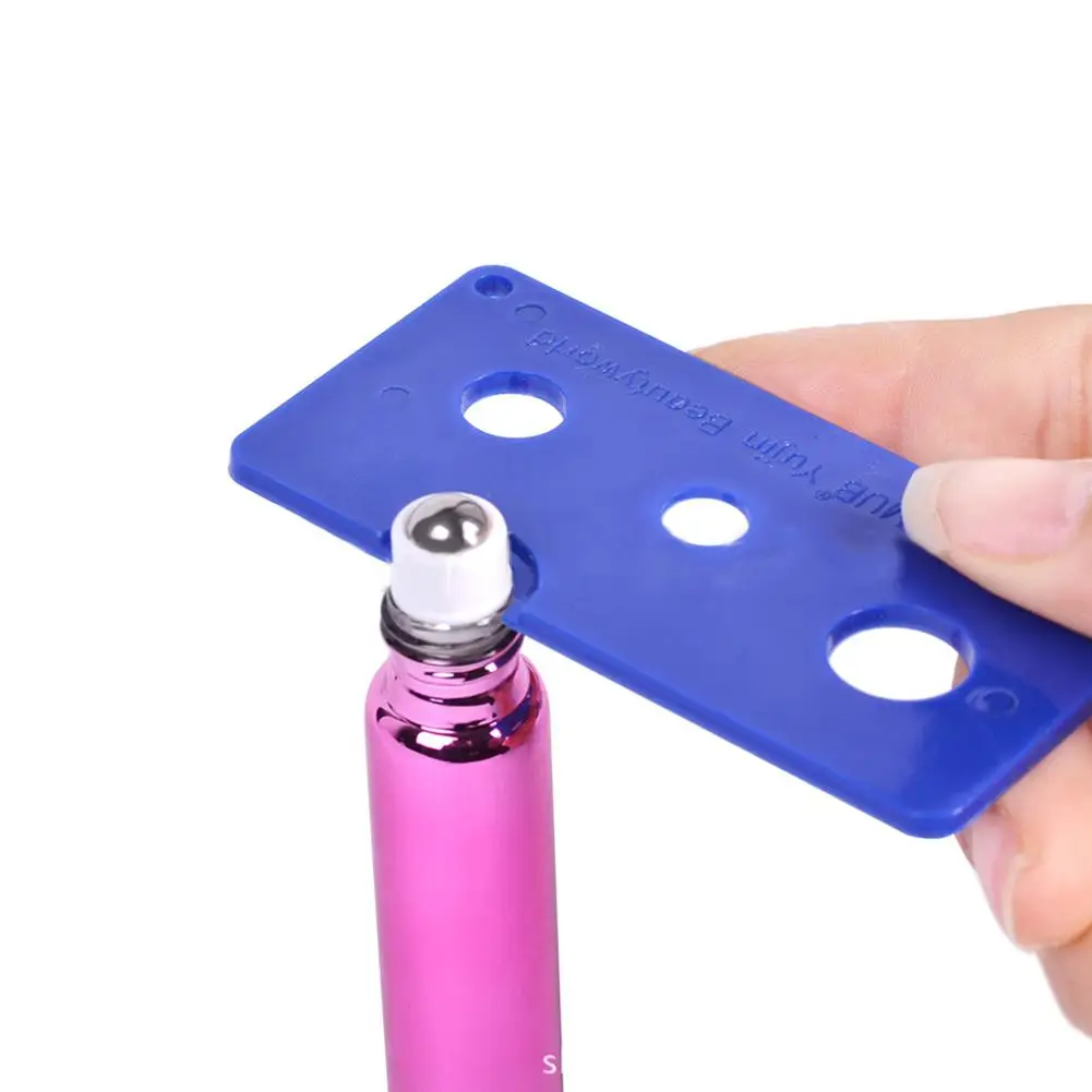 

Durable Solid Color Essential Oil Bottle Opener Key Tool Roller Ball Cap Remover