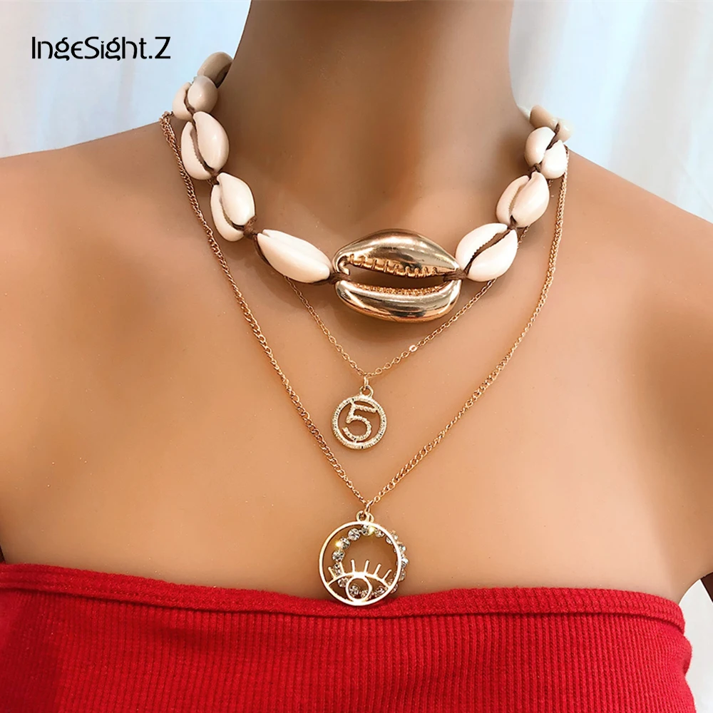 

IngeSight.Z 2Pcs/Set Multi Layered Cowrie Shell Choker Necklace Collar Statement Crystal Circle Pendant Necklace Women Jewelry