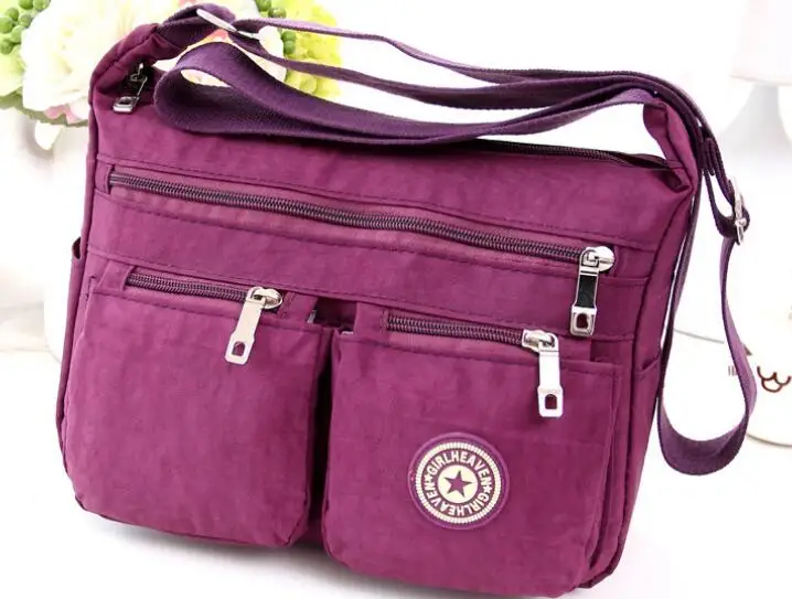 

2018 new European and American fashion one shoulder slung canvas bag waterproof nylon light Oxford cloth travel bag