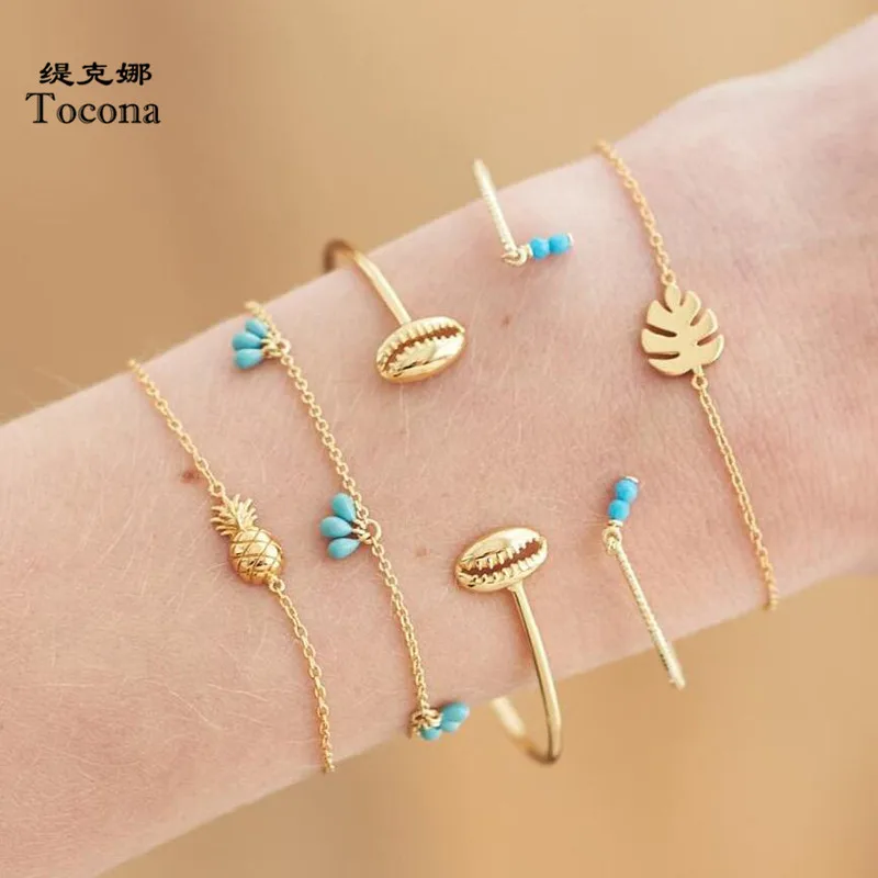 

Tocona 5pcs/sets Bohemia Bracelets Gold Color Pineapple Shell Leaf Shape Bangles Beach Summer Jewelry Women Ladies Gift